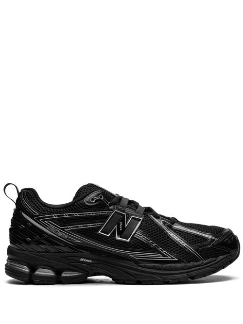 Sneaker nera di NEW BALANCE caratterizzata da logo laterale, suola segmentata e lacci. NEW BALANCE | M1906RCHBLACK